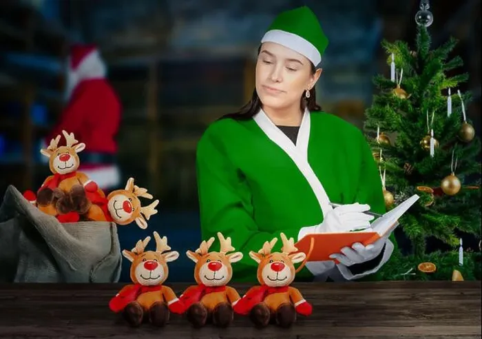 Framed Print : Look into santa claus magical workshop as an elf is checking toys