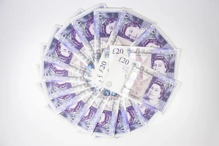 Framed Print : Looking down on a circle of Twenty pound notes on a table Framed Print : Looking down on a circle of Twenty pound notes on a table