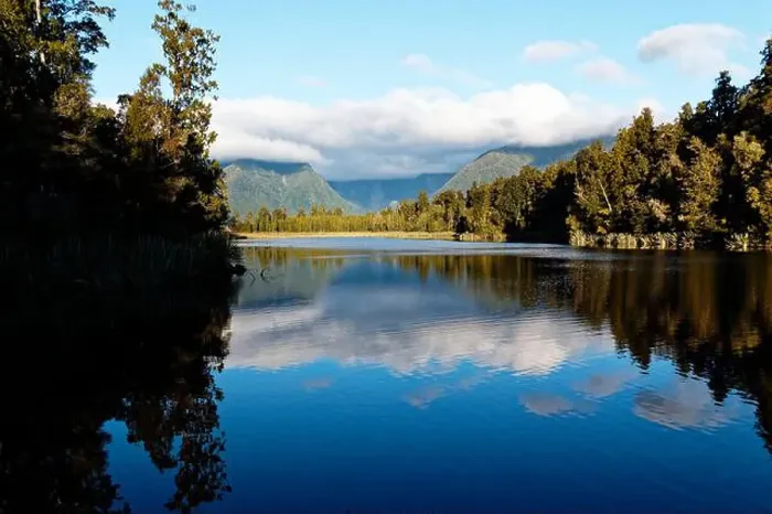 Framed Print : Looking down Lake Matheson from Reflection Island, West Coast, New Zealand Framed Print : Looking down Lake Matheson from Reflection Island, West Coast, New Zealand