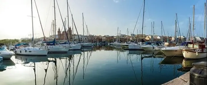 Framed Print : A lot of modern yachts and boats are moored to the shore of Malta. Amazing view of the harbor at sunset Framed Print : A lot of modern yachts and boats are moored to the shore of Malta. Amazing view of the harbor at sunset
