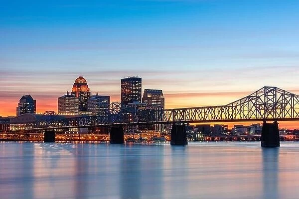 Louisville, Kentucky, USA skyline on the river at dusk