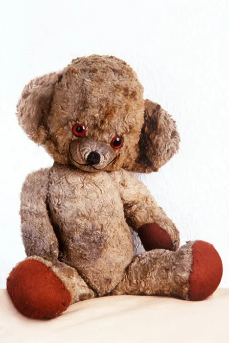 Framed Print : Well loved scruffy old teddy bear seated Framed Print : Well loved scruffy old teddy bear seated