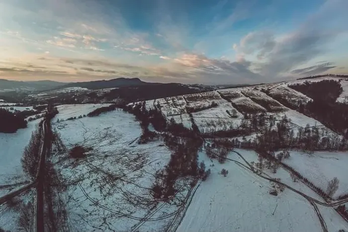 Framed Print : Lower Beskid, Carpathian Mountain Range in winter aerial view, orange and pink sky