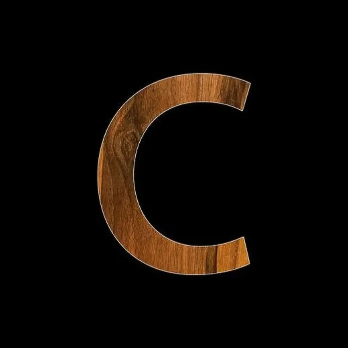 Framed Print : lowercase letter c - wood texture - black background Framed Print : lowercase letter c - wood texture - black background