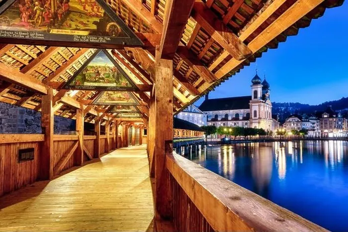 Framed Print : Lucerne city, Switzerland, view of Jesuit church from historical wooden Chapel Bridge Framed Print : Lucerne city, Switzerland, view of Jesuit church from historical wooden Chapel Bridge