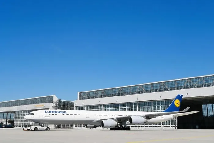 Framed Print : Lufthansa Airbus A340 with push-back truck in front of maintenance hangar, Hangar, Munich, Upper Bavaria, Germany Framed Print : Lufthansa Airbus A340 with push-back truck in front of maintenance hangar, Hangar, Munich, Upper Bavaria, Germany