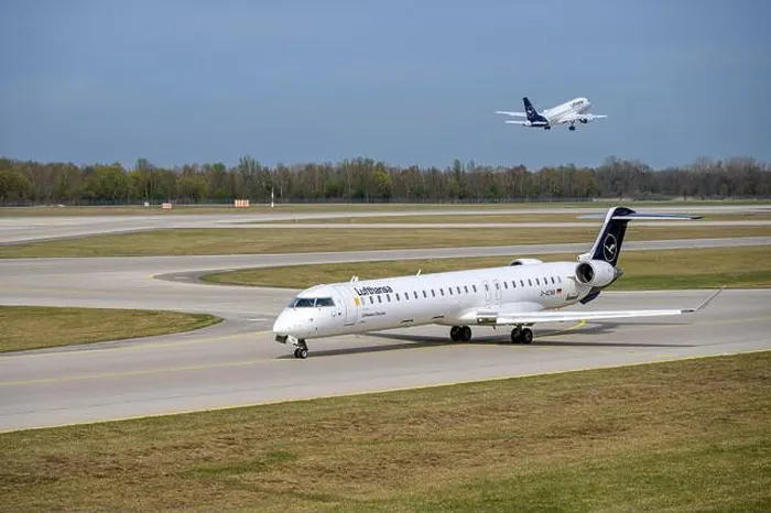 Framed Print : Lufthansa CityLine Mitsubishi CRJ-900LR With The Aircraft Registration D-ACNA Is Taxiing For Take Off On The Northern Framed Print : Lufthansa CityLine Mitsubishi CRJ-900LR With The Aircraft Registration D-ACNA Is Taxiing For Take Off On The Northern