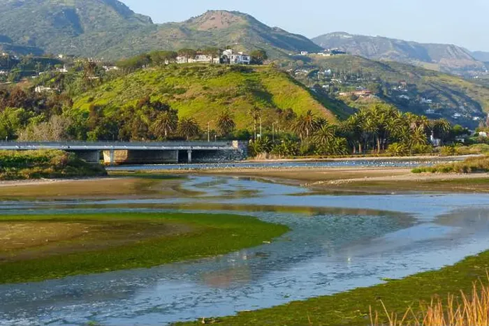 Framed Print : Lush green hills surround lagoon at Malibu Framed Print : Lush green hills surround lagoon at Malibu