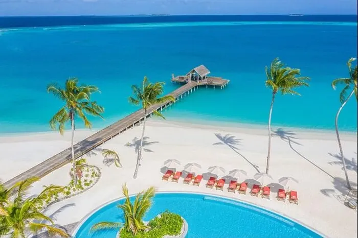 Framed Print : Luxury bay and beach from aerial top view, amazing beachfront, swimming pool on tropical island beach. Palm trees in sunlight, beautiful blue ocean Framed Print : Luxury bay and beach from aerial top view, amazing beachfront, swimming pool on tropical island beach. Palm trees in sunlight, beautiful blue ocean