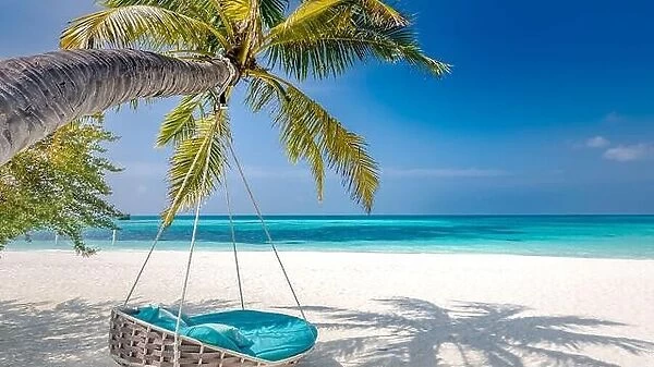 Luxury beach panorama. Tropical landscape with palm tree and swing for couple summer holiday or vacation, sea view over white sand. Exotic nature