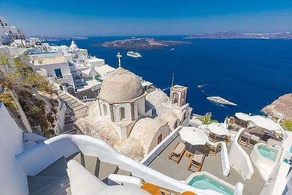 Luxury summer relaxation background. Summer vacation at Santorini, swimming pools, hot tubs looking out over the Caldera sea view of Santorini, Greece