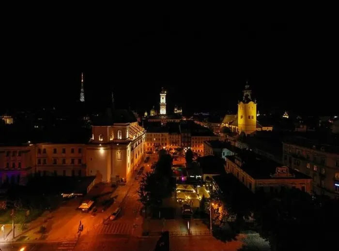 Framed Print : Lviv, Ukraine - August, 2020: View on Lviv city hall at night from drone Framed Print : Lviv, Ukraine - August, 2020: View on Lviv city hall at night from drone