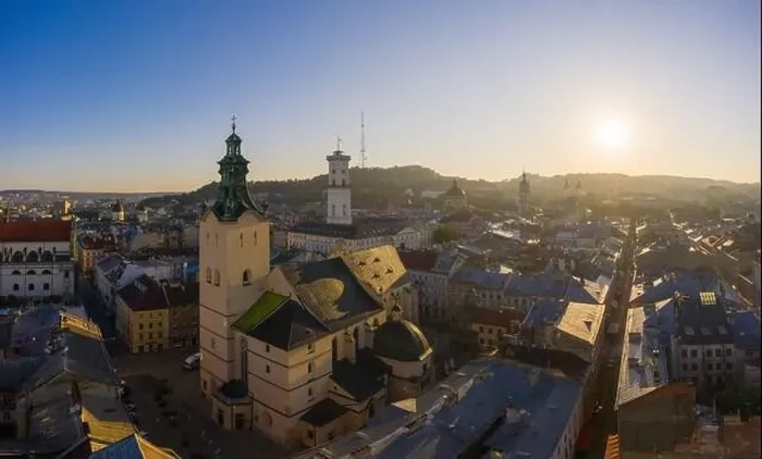 Framed Print : Lviv, Ukraine - August 24, 2020: Aerial view on City Hall and Latin Cathedral in Lviv, Ukraine from drone