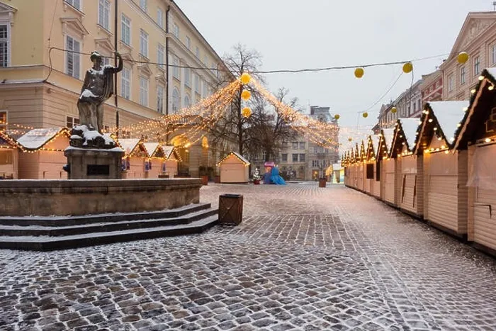 Framed Print : Lviv in winter time. Picturesque evening view on christmas fair on city center. Eastern Europe, Ukraine Framed Print : Lviv in winter time. Picturesque evening view on christmas fair on city center. Eastern Europe, Ukraine