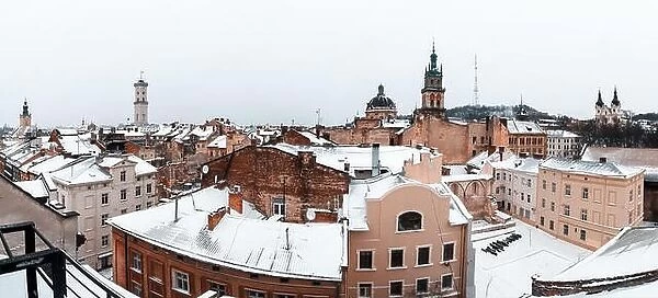 Lviv in winter time. Picturesque view on Lviv city center from top of old roof. Eastern Europe, Ukraine