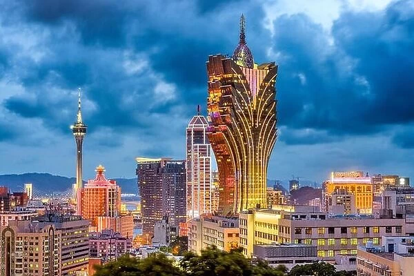 Macau, China city skyline at dusk