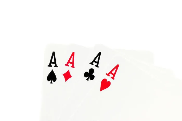 Framed Print : Macro shot of four aces over white Framed Print : Macro shot of four aces over white