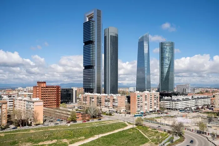 Framed Print : Madrid cityscape at daytime. Landscape of Madrid business building at Four Tower. Modern high building in business district area at Spain Framed Print : Madrid cityscape at daytime. Landscape of Madrid business building at Four Tower. Modern high building in business district area at Spain
