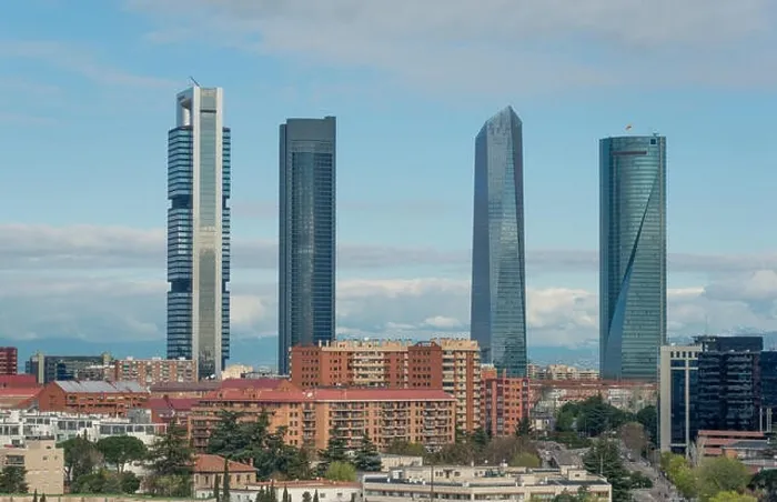 Framed Print : Madrid cityscape at daytime. Landscape of Madrid business building at Four Tower. Modern high building in business district area at Spain Framed Print : Madrid cityscape at daytime. Landscape of Madrid business building at Four Tower. Modern high building in business district area at Spain