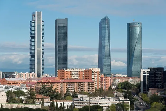 Framed Print : Madrid cityscape at daytime. Landscape of Madrid business building at Four Tower. Modern high building in business district area at Spain Framed Print : Madrid cityscape at daytime. Landscape of Madrid business building at Four Tower. Modern high building in business district area at Spain