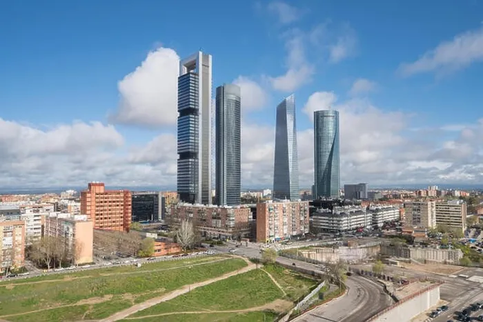 Framed Print : Madrid cityscape at daytime. Landscape of Madrid business building at Four Tower. Modern high building in business district area at Spain Framed Print : Madrid cityscape at daytime. Landscape of Madrid business building at Four Tower. Modern high building in business district area at Spain