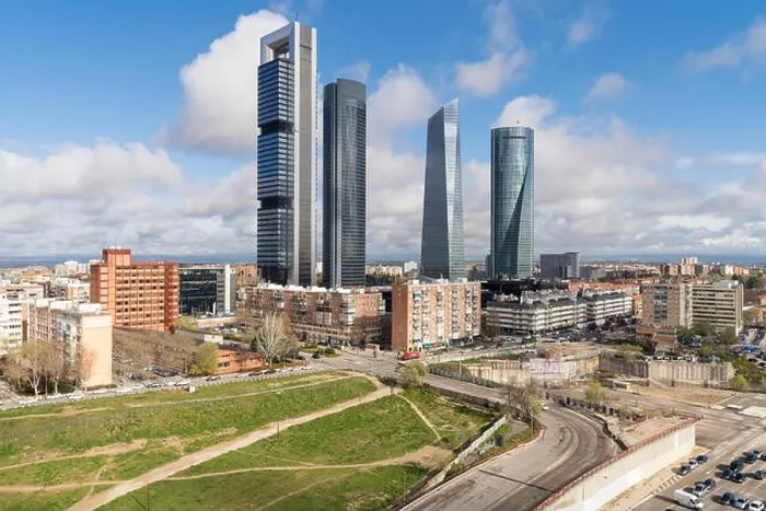 Framed Print : Madrid cityscape at daytime. Landscape of Madrid business building at Four Tower. Modern high building in business district area at Spain Framed Print : Madrid cityscape at daytime. Landscape of Madrid business building at Four Tower. Modern high building in business district area at Spain