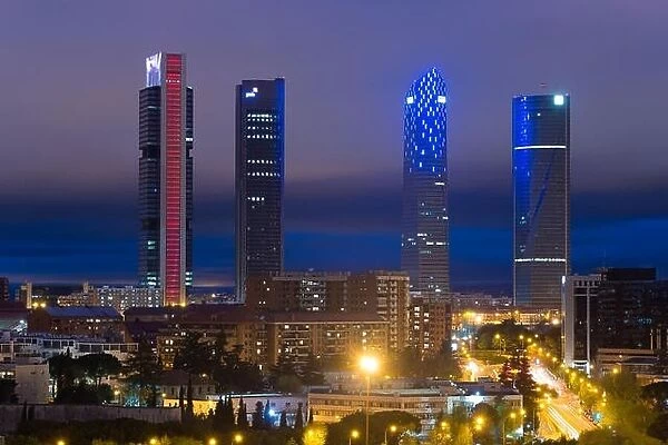 Madrid cityscape at night. Landscape of Madrid business building at Four Tower. Modern high building in business district area at Spain