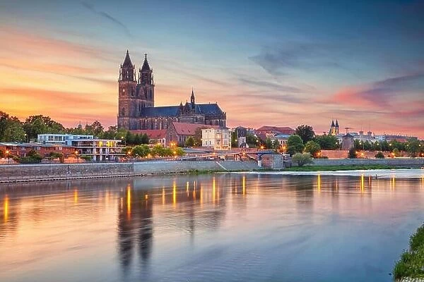 Magdeburg, Germany. Cityscape image of Magdeburg, Germany with reflection of the city in the Elbe river, during sunset