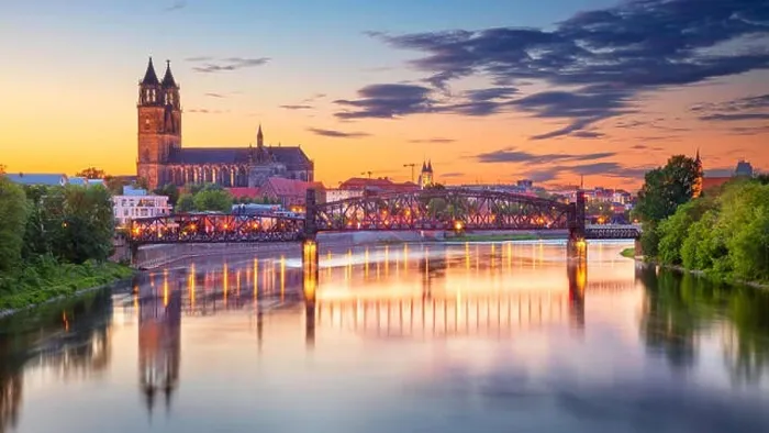 Framed Print : Magdeburg, Germany. Cityscape image of Magdeburg, Germany with reflection of the city in the Elbe river, during sunset Framed Print : Magdeburg, Germany. Cityscape image of Magdeburg, Germany with reflection of the city in the Elbe river, during sunset