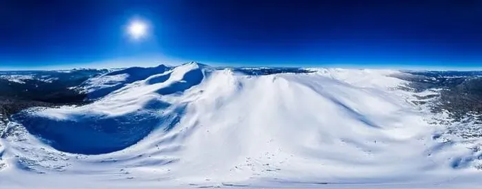 Framed Print : Magical panorama of a beautiful hill in the mountains covered by snow on the ski slope on a sunny day with a clear blue Framed Print : Magical panorama of a beautiful hill in the mountains covered by snow on the ski slope on a sunny day with a clear blue