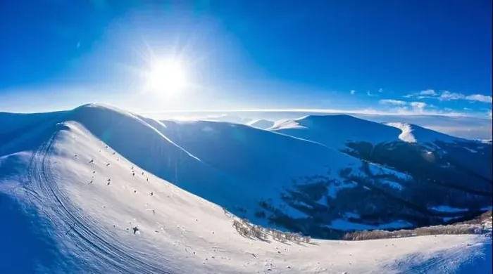 Framed Print : Magical winter panorama of beautiful snowy slopes at a ski resort in Europe on a sunny Framed Print : Magical winter panorama of beautiful snowy slopes at a ski resort in Europe on a sunny