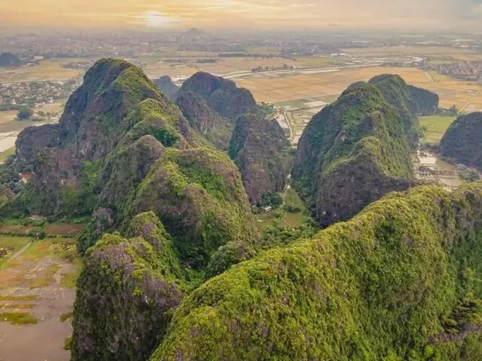 Framed Print : the majestic scenery on Ngo Dong river in Tam Coc Bich Dong view from drone in Ninh Binh province of Viet Nam Framed Print : the majestic scenery on Ngo Dong river in Tam Coc Bich Dong view from drone in Ninh Binh province of Viet Nam