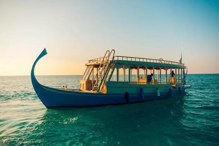 Framed Print : Maldives background with boat and tropical beach scene, blue sea and blue sky with colorful traditional Maldive boat Framed Print : Maldives background with boat and tropical beach scene, blue sea and blue sky with colorful traditional Maldive boat