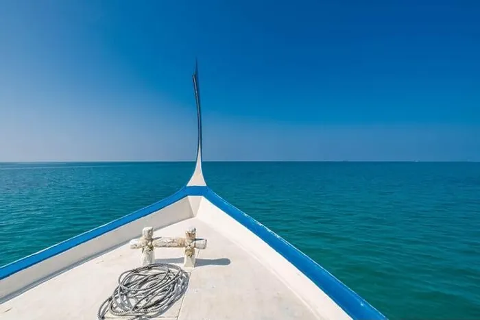 Framed Print : Maldives background with boat and tropical beach scene, blue sea and blue sky with colorful traditional Maldive boat Framed Print : Maldives background with boat and tropical beach scene, blue sea and blue sky with colorful traditional Maldive boat