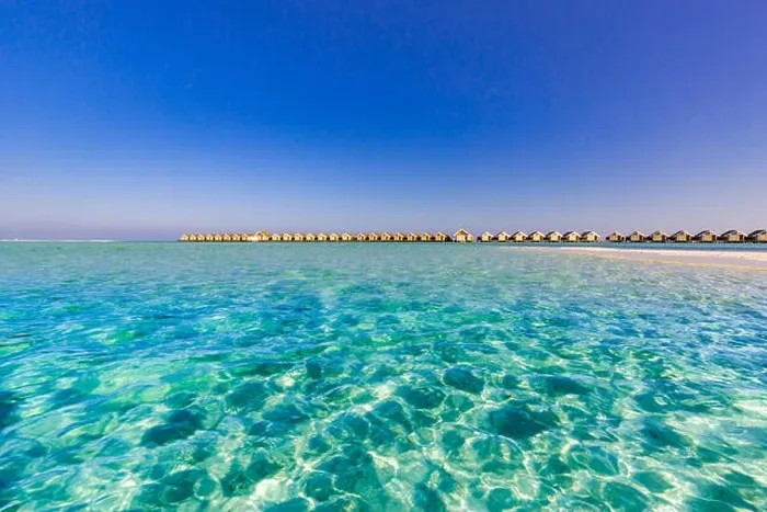 Framed Print : Maldives island beach panorama. Palm trees and beach bar and long wooden pier pathway. Tropical vacation and summer holiday background concept Framed Print : Maldives island beach panorama. Palm trees and beach bar and long wooden pier pathway. Tropical vacation and summer holiday background concept