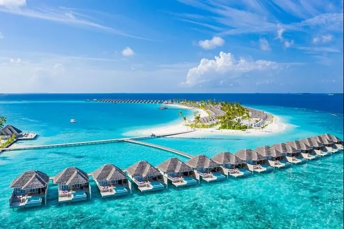 Framed Print : Maldives paradise island. Tropical aerial landscape, seascape with long jetty, water villas with amazing sea and lagoon beach tropical nature. Exotic Framed Print : Maldives paradise island. Tropical aerial landscape, seascape with long jetty, water villas with amazing sea and lagoon beach tropical nature. Exotic
