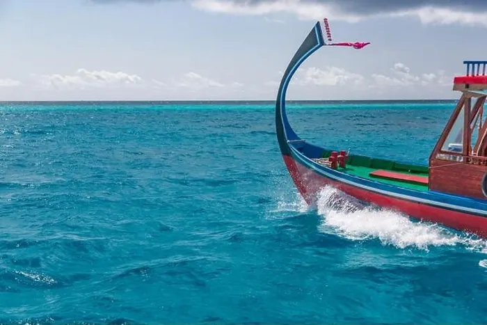 Framed Print : Maldives traditional wooden boat Dhoni and perfect blue sea with lagoon. Luxury tropical paradise concept. Exotic travel landscape, seascape Maldives Framed Print : Maldives traditional wooden boat Dhoni and perfect blue sea with lagoon. Luxury tropical paradise concept. Exotic travel landscape, seascape Maldives