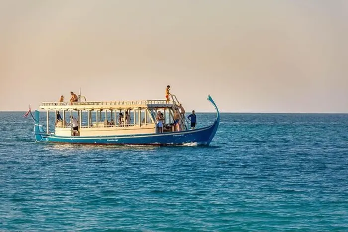 Framed Print : Maldives: Wonderful Maldivian boat Dhoni on tropical blue sea, taking tourist to a sunset cruise Framed Print : Maldives: Wonderful Maldivian boat Dhoni on tropical blue sea, taking tourist to a sunset cruise