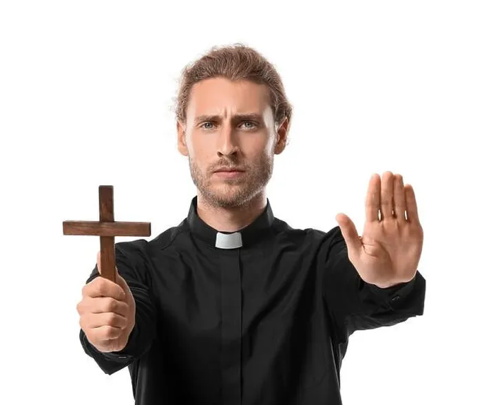 Framed Print : Male priest with cross on white background Framed Print : Male priest with cross on white background