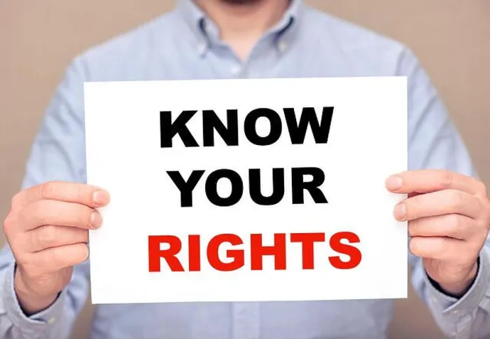 Framed Print : A man businessman holding white sheet with text Know Your Rights Framed Print : A man businessman holding white sheet with text Know Your Rights