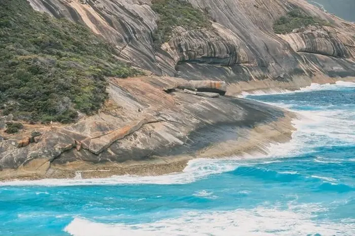 Framed Print : A man is fishing on big rocks, with big waves in Salmon hole, Albany, Western Australia Framed Print : A man is fishing on big rocks, with big waves in Salmon hole, Albany, Western Australia