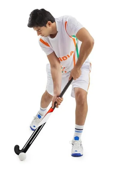 Framed Print : Man playing field hockey isolated over white background Framed Print : Man playing field hockey isolated over white background