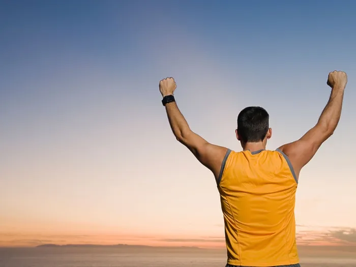 Framed Print : Man raising arms Framed Print : Man raising arms