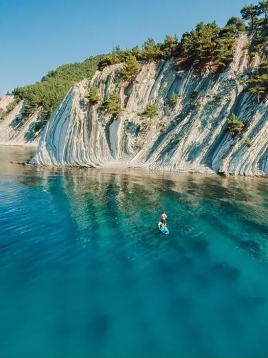 Framed Print : Man on stand up paddle board in blue sea. Surfer on SUP board in Mediterranean sea with mountain landscape. Aerial view Framed Print : Man on stand up paddle board in blue sea. Surfer on SUP board in Mediterranean sea with mountain landscape. Aerial view
