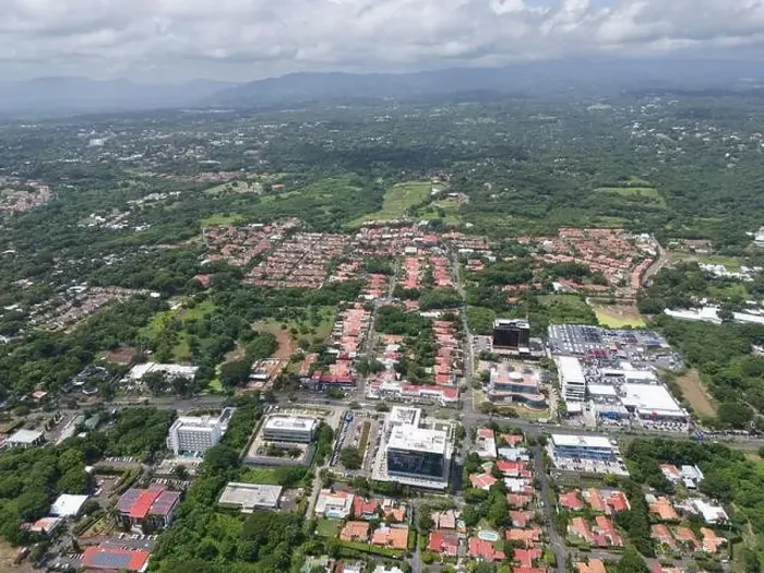 Framed Print : Managua, Nicaragua - August 16, 2024: Business district in Managua city aerial drone view Framed Print : Managua, Nicaragua - August 16, 2024: Business district in Managua city aerial drone view