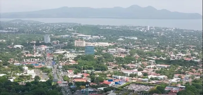 Framed Print : Managua, Nicaragua - August 16, 2024: Business center of Managua city aerial drone view Framed Print : Managua, Nicaragua - August 16, 2024: Business center of Managua city aerial drone view