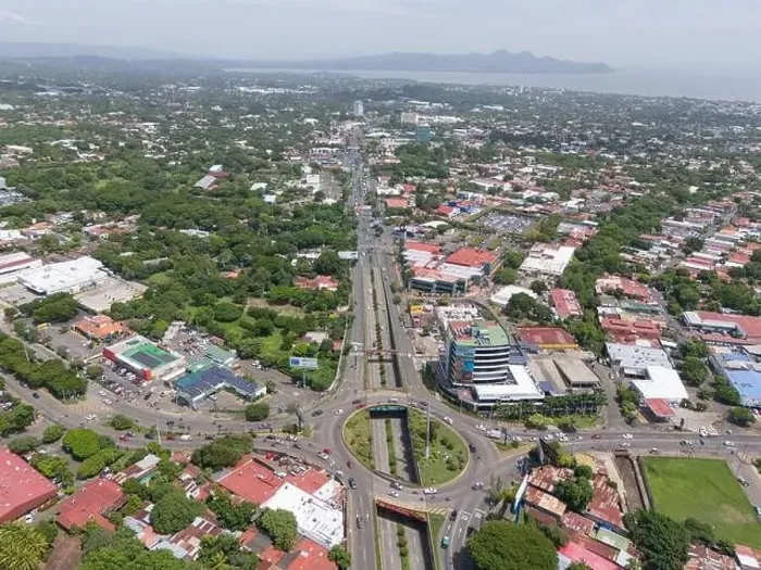 Framed Print : Managua, Nicaragua - August 16, 2024: Main Masaya road in Managua city aerial drone view Framed Print : Managua, Nicaragua - August 16, 2024: Main Masaya road in Managua city aerial drone view