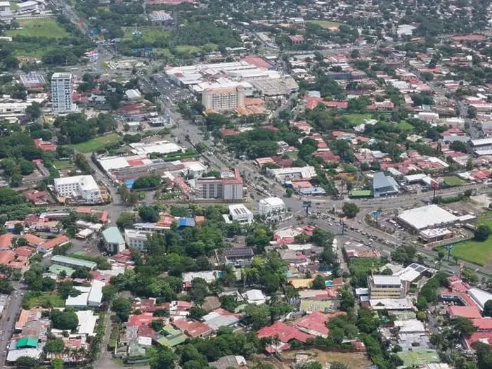 Framed Print : Managua, Nicaragua - August 16, 2024: Car traffic in Managua city aerial drone view Framed Print : Managua, Nicaragua - August 16, 2024: Car traffic in Managua city aerial drone view