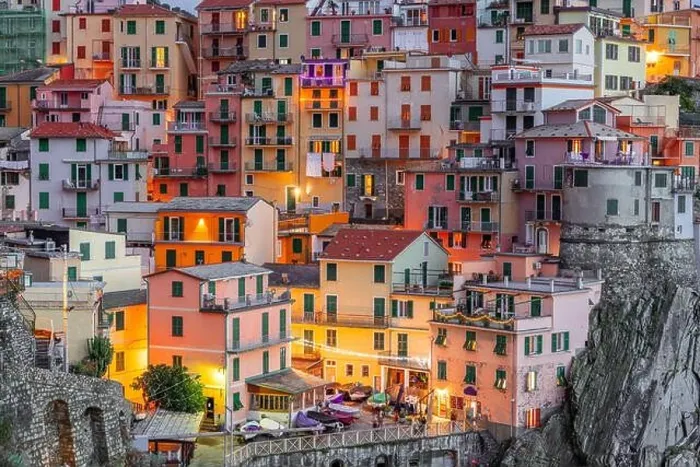 Framed Print : Manarola, La Spezia, Italy coastal view in Cinque Terre at twilight Framed Print : Manarola, La Spezia, Italy coastal view in Cinque Terre at twilight