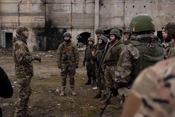 Framed Print : March 15, 2024, Kyiv, Ukraine: A group of trainees listens to the military instructor in a training organised by the third separate assault brigade Framed Print : March 15, 2024, Kyiv, Ukraine: A group of trainees listens to the military instructor in a training organised by the third separate assault brigade